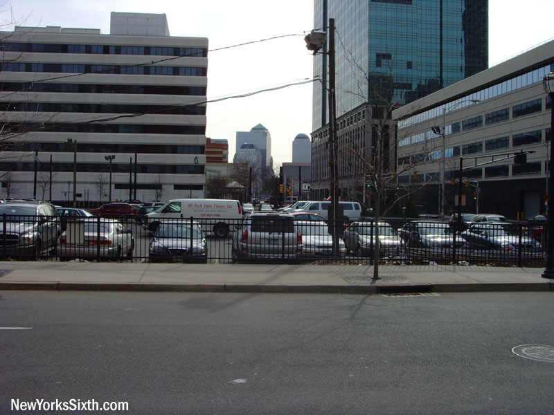 The site of Harborside Plaza 4 in Jersey City; a tower will soon rise from the vacant parking lot