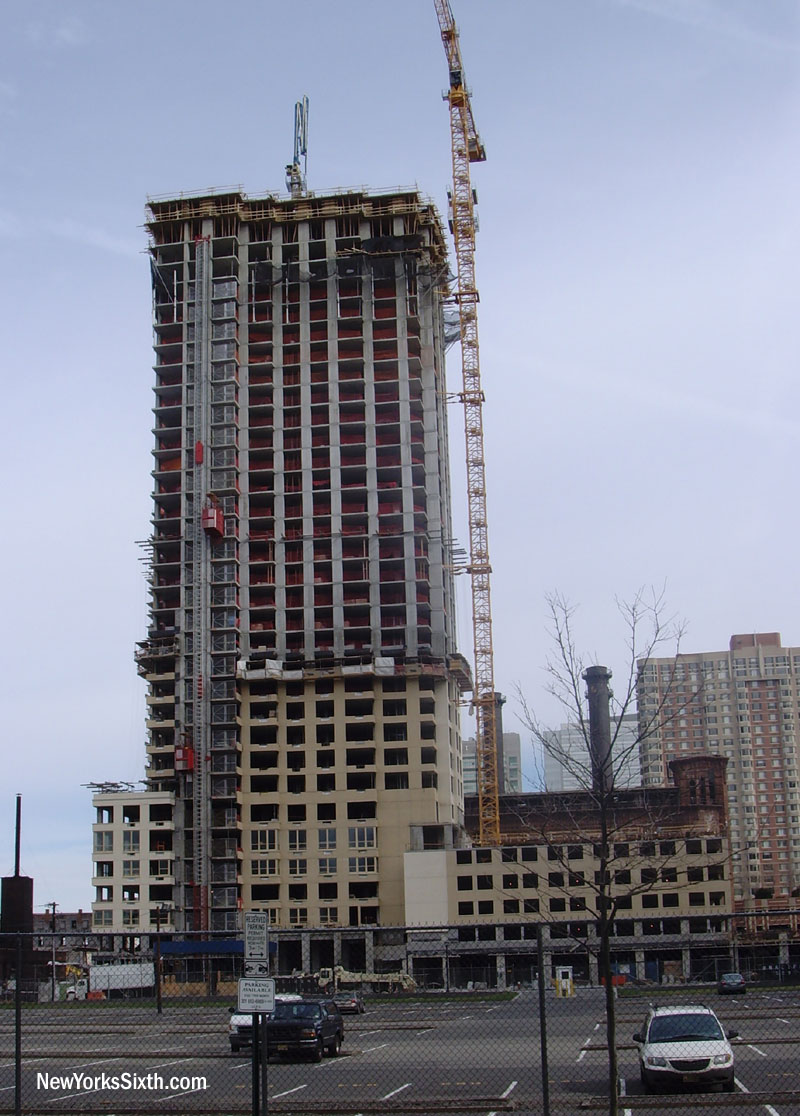 The Jersey City Trump Tower has grown so tall that horizontal photographs are all but impossible from Pearl Street